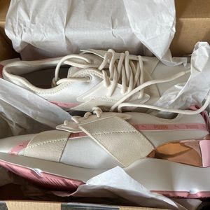Pink and white Pumas